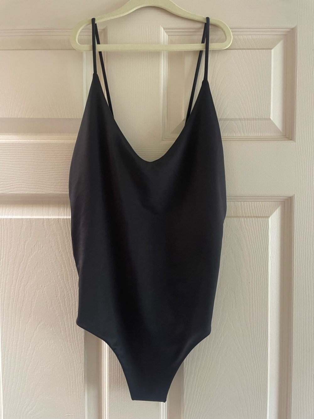Sleek Black One-Piece Swimsuit with Slim Straps